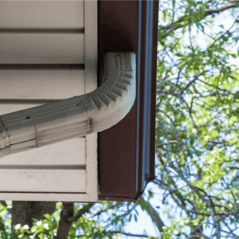 Eavestrough installation in Kitchener protecting home landscaping